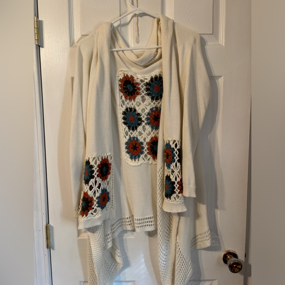 B. Sharp crochet accents sweater size large
